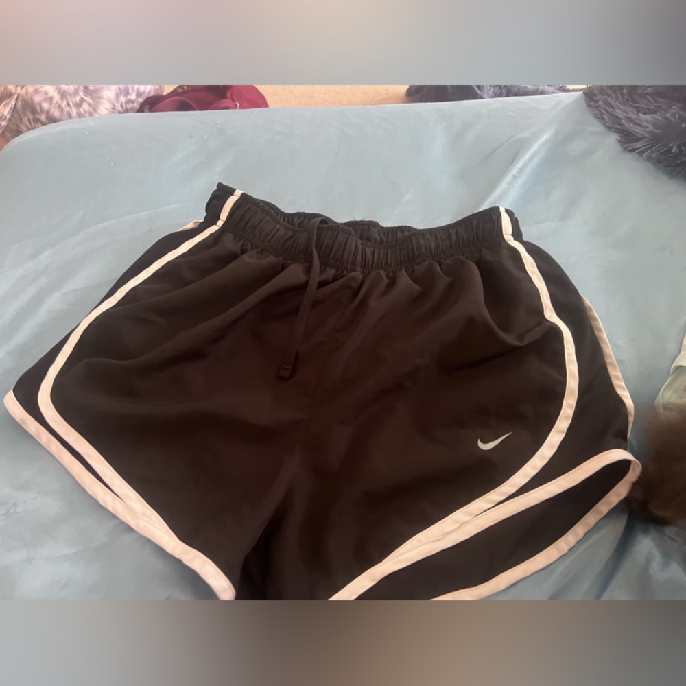 Black and white womens size small nike dry fit athletic shorts. Good as new!